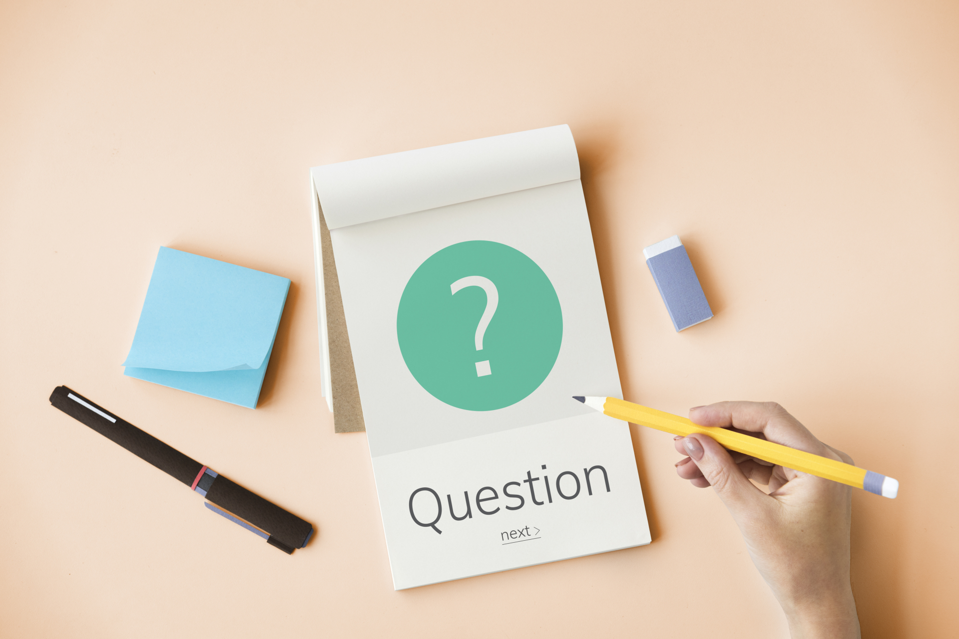 How well is your home care service performing? Time to carry out a mock CQC Inspection. Image of a notepad with a question mark on it.