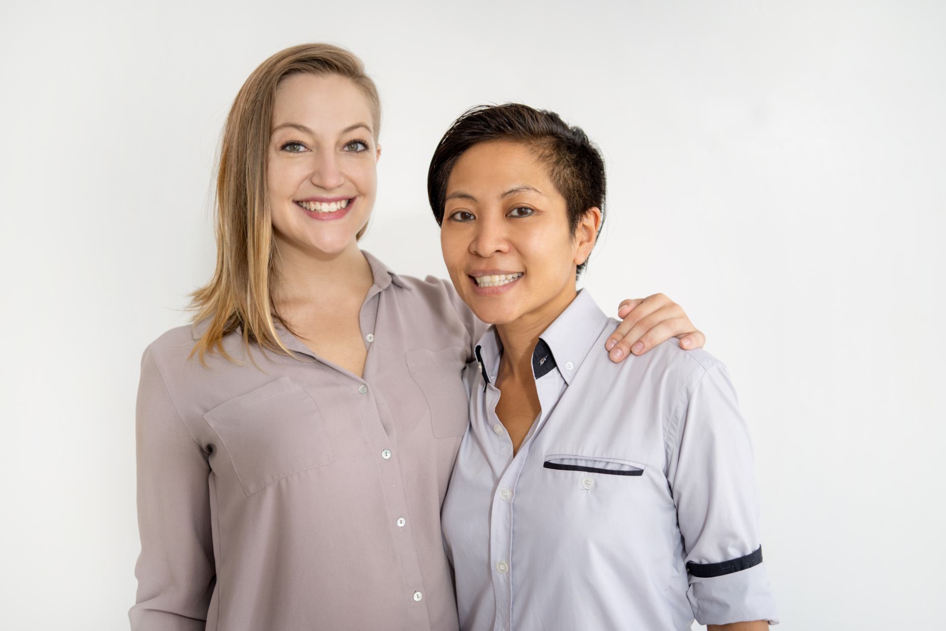 Image of a supportive home care agency owner with one of her happy employees.